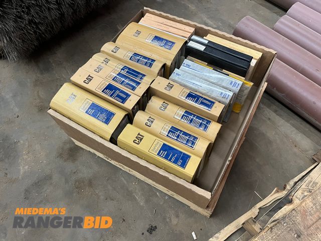 Lot 30-3956 - Box Cat Manuals Motor Grader and Loader Box of Manuals, Cat Motor Grader and Loader, Ford Truck
