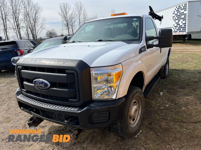 Lot 30-2465 - 2014 Ford F-250 SD with a 6.2L V8 OHV 16V engine. Regular Cab Long Box Pickup Truck Plow Truck 4x4