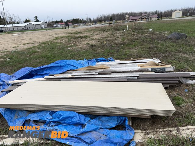 Lot 30-5773 - Large lot of assorted cuts of building products, including small sections of Diamond Kote, wood comp...