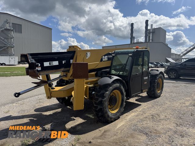 Lot 30-10667 - 2015 CAT TL1255C Telehandler Boom has been broken off, Runs and operates as it should.