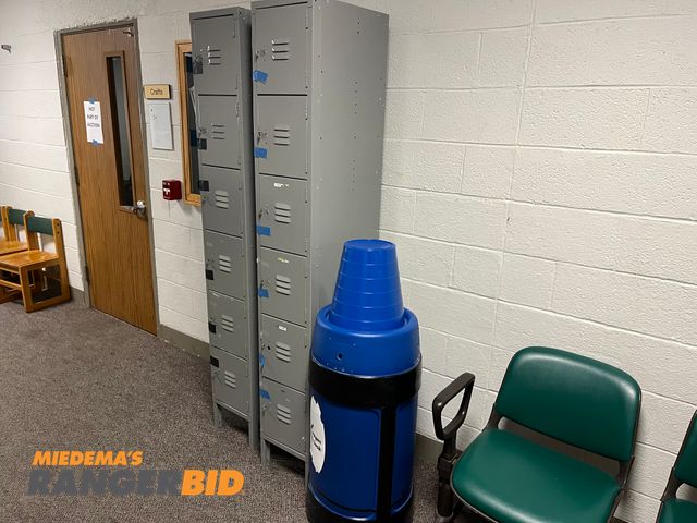 Lot 30-45988 - Lot f 92) Lockers, (1) giant crayon, and (1) overhead desk compartment. Buyer is responsible for removal.