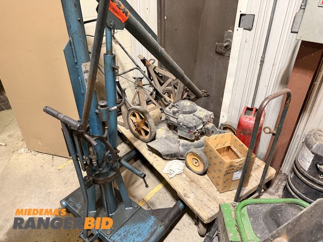 Lot 30-3152 - Lawn mower (works), Cherry Picker (works but leaks oil), cart, jackstands, and more.