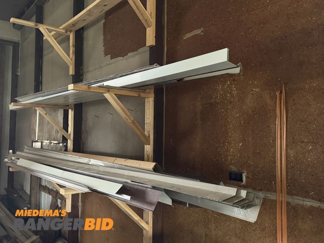 Lot 30-5736 - Entire contents of metal trim shown in photos (content of rack only).