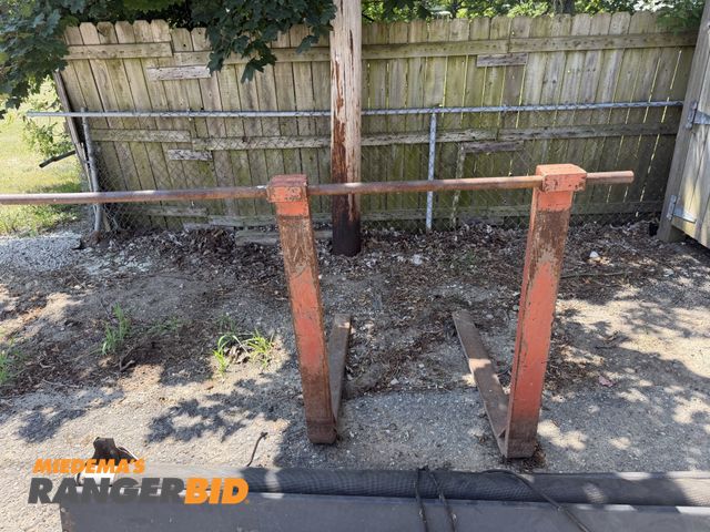 Lot 30-11308 - Hang on bucket pallet forks  Set of pallet forks, hang from hooks on equipment bucket.