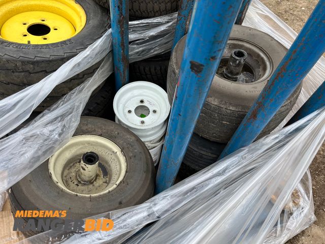 Lot 30-4936 - Lot includes rack and tires and rims shown, seller will load. Located in Rangerbid Row