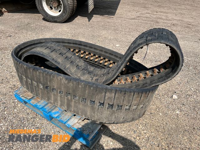 Lot 30-3666 - (2) Skid Steer Lot of (2) Rubber Skid Steer Tracks.  Still some life left. Came off CAT 259D3