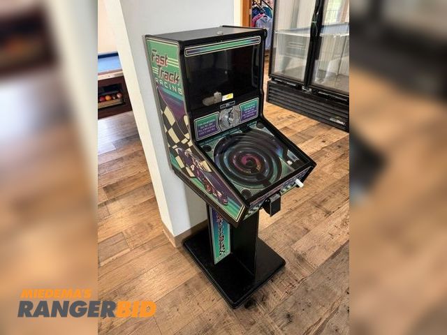 Lot 30-54608 - Fast Track Racer vending machine, a mechanical game designed to vend a gumball or small product afte...