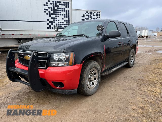 Lot 30-10247 - 2013 Chevrolet Tahoe with a 5.3L V8 OHV 16V FFV engine. Police RWD