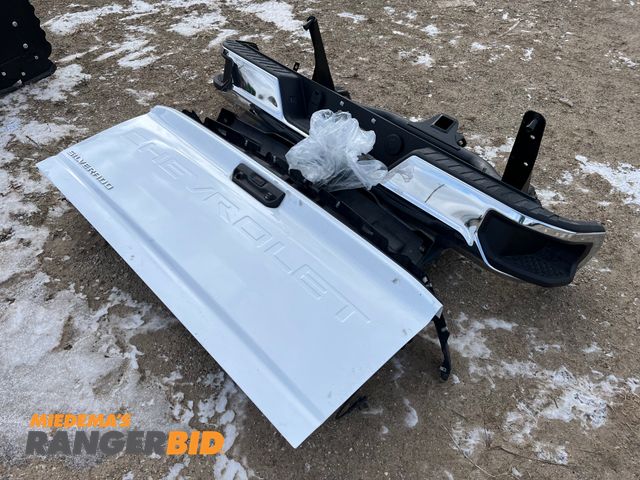 Lot 30-3068 - New 2025 Chevrolet Silverado 2500 Tailgate, Rear Chrome Bumper, Hitch, Front Wind Dam, Trim, and Har...