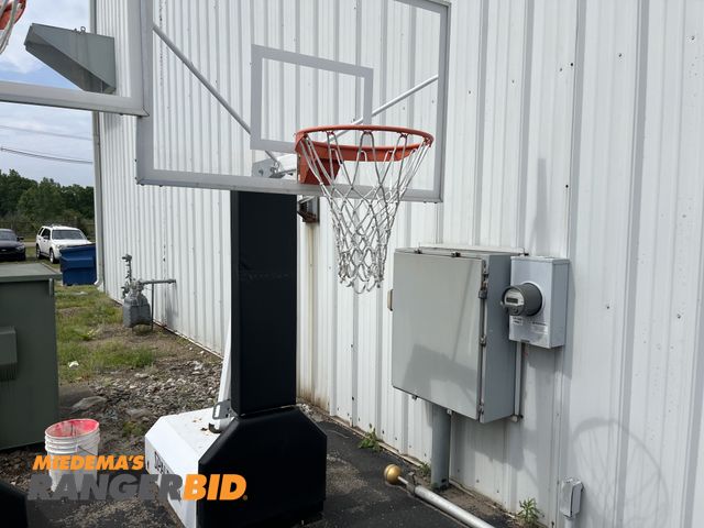 Lot 30-992 - (1) Spalding Heavy Duty Basket Ball Hoop - Portable, Adjustable On casters. Municipality owned.