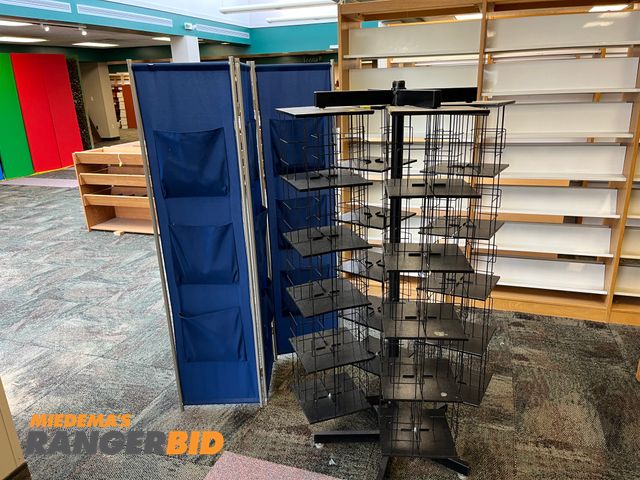 Lot 30-4092 - Lot includes the display racks shown. Buyer is responsible for removal.