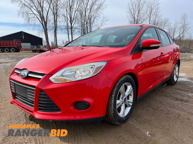 Lot 30-452 - 2014 Ford Focus with a 2.0L L4 DOHC 16V engine. SE with 47,933 miles Sedan FWD