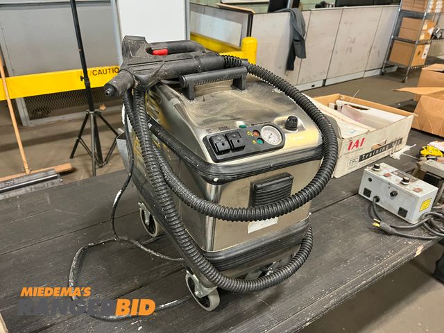 Lot 30-2423 - Steam Cleaning Machine Never used. There is a dent on top