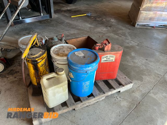 Lot 30-2925 - Pallet of Miscellaneous items including working drill sharpener, gas cans, lawn mower (works, but self propelled does not)