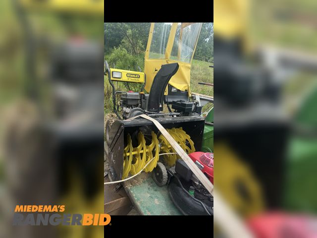 Lot 30-10952 - Stanley snow blower, 36” wide, electric start and pull start, like new condition, with light,