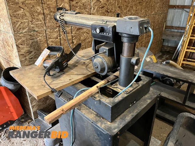Lot 30-1104 - Lot includes Remington chainsaw and Craftsman Radial arm saw, both electric