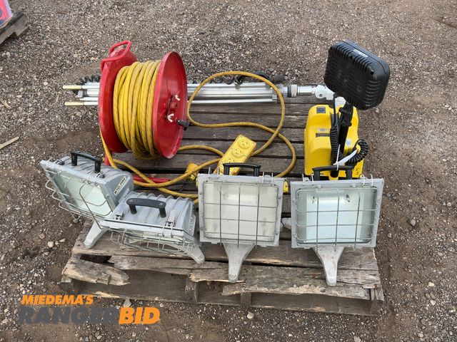 Lot 30-2357 - Lot of (4) Work Lights with 20 Amp 125 Volt Locking Plugs , (1) Heavy Duty Manual Cord Reel with 20 ...