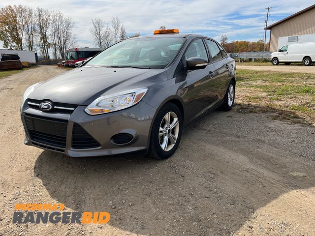 Lot 30-2887 - 2014 Ford Focus with a 2.0L L4 DOHC 16V engine. SE with 19,384 miles Sedan FWD