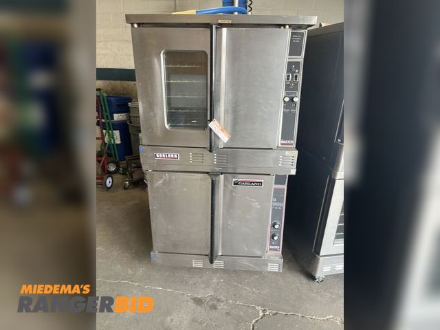 Lot 30-5093 - Commercial Stove Garland double stackable ovens on casters. Operates on 120 volts and  natural gas. ...