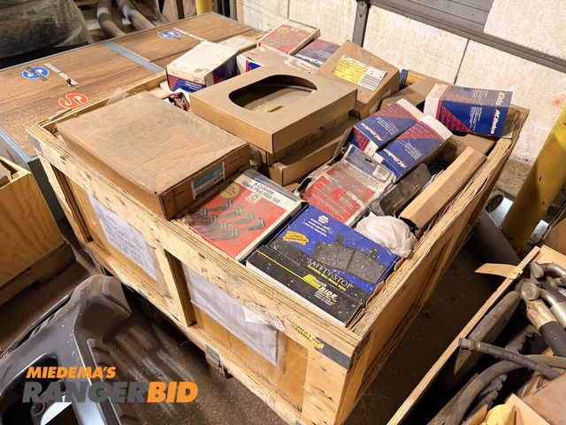 Lot 30-3740 - Pallet of auto parts including brake parts and spark plug parts and more.