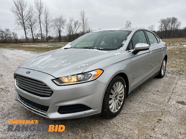 Lot 30-619 - 2014 Ford Fusion Hybrid with a 2.0L L4 DOHC 16V HYBRID engine. S with 92,562 Miles Sedan Hybrid FWD