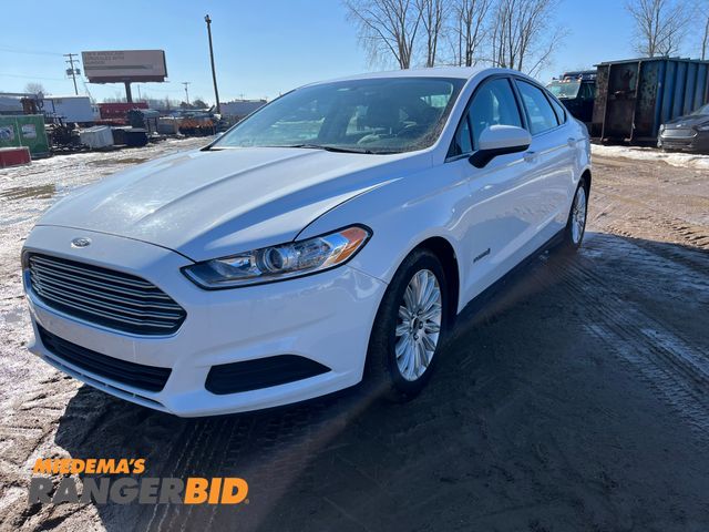 Lot 30-567 - 2015 Ford Fusion Hybrid with a 2.0L L4 DOHC 16V HYBRID engine. S with 71,354 Miles Sedan Hybrid FWD
