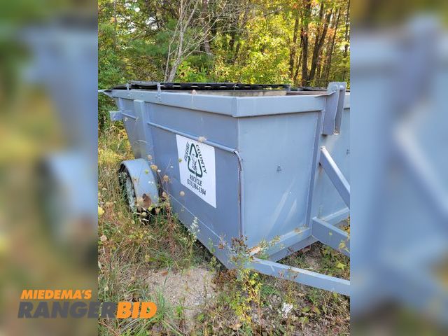 Lot 30-1003 - Lot of (4) Towable Dumpsters This is not a titled item. Municipality owned. Please note that this is located at the recycle center.