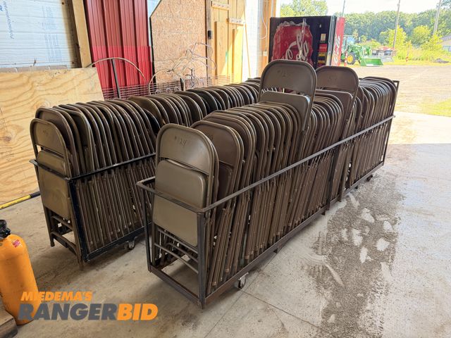 Lot 30-4390 - Lot of approximately 100 steel folding chairs with carts.