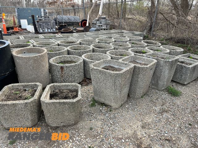 Lot 30-146 - Large quantity of planters, including concrete Most have dirt in them.