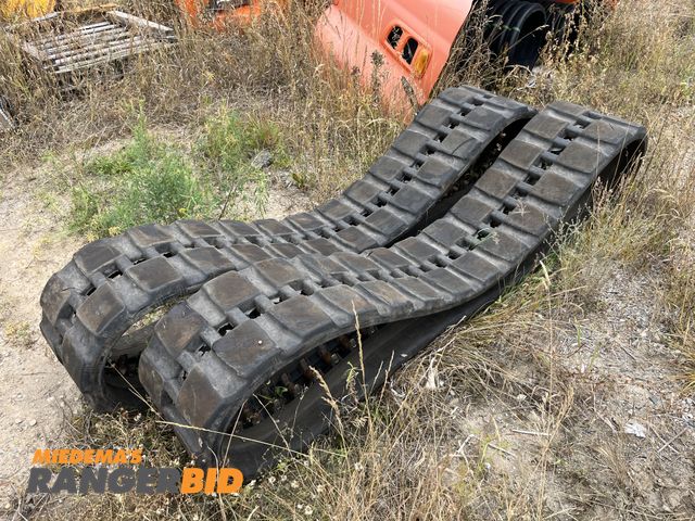 Lot 30-769 - (2) Skid Steer Tracks with some life left