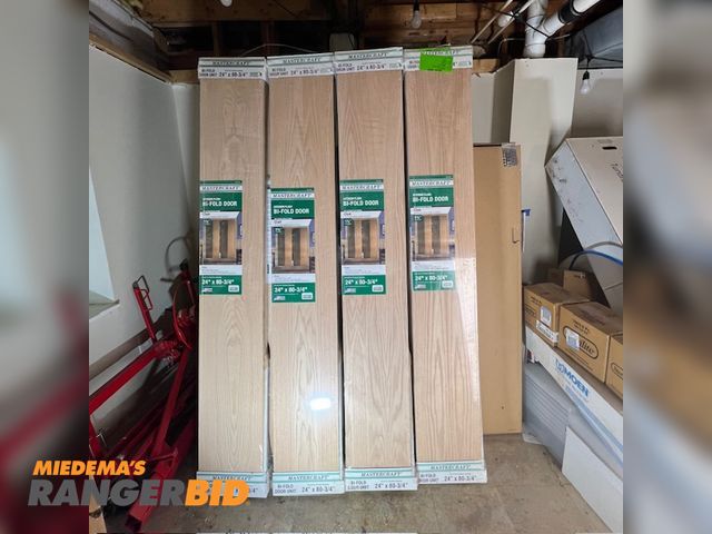 Lot 30-524 - 4 Mastercraft 24_oakflush_2_leaf Oak flush bi fold closet door