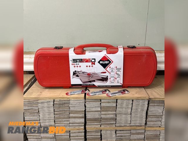 Lot 30-0 - 1 New Rubi 24 Inch Manual Tile Cutter Tile Cutter Rubi 24 inch manual tile cutter new in box with three (3) NIB cutting wheels.