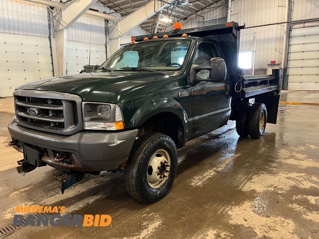 Lot 30-2477 - 2003 Ford F-350 SD with a 5.4L V8 SOHC 16V engine. XL with 40,040 miles Regular Cab Dump Bed Pickup ...