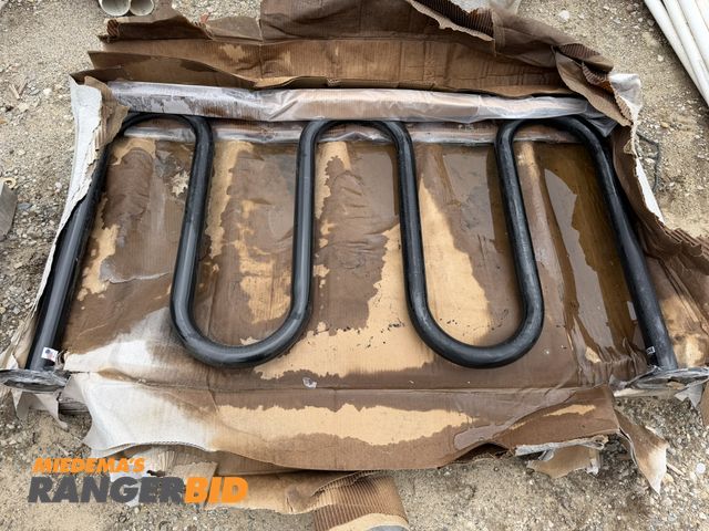 Lot 30-5839 - Lot of (1) Uline approx. 63" length x 34" height bent tube steel bicycle rack with 7" bolt flange.