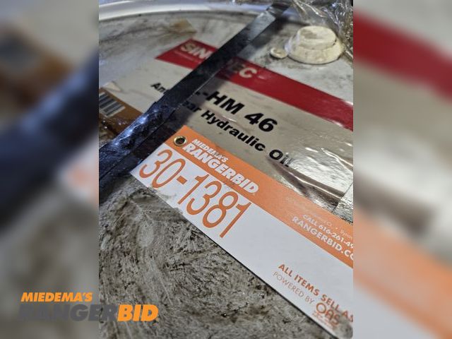 Lot 30-1381 - About 20 gallons of #46 Hydraulic Oil , Drum, and Pump.  Lift truck on site to load