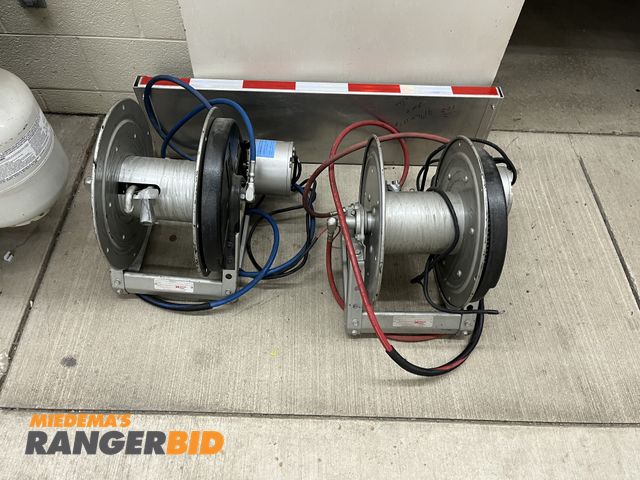 Lot 30-1558 - Lot includes (2) Hydraulic Hose reels with hoses.