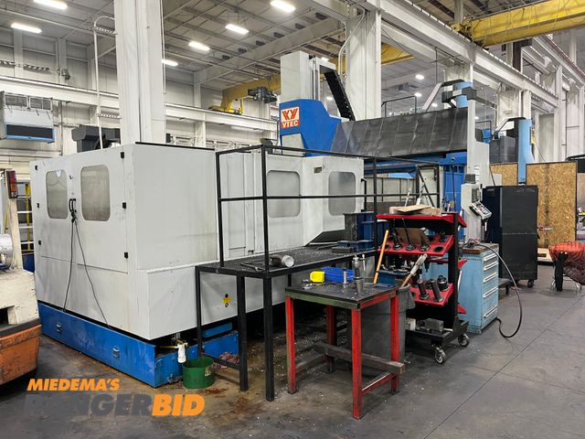 Lot 30-2642 - 2006 VTec VF4000 CNC Bridge Mill New Spindle in October. Table size is 80" x 166". 40 tool changer.