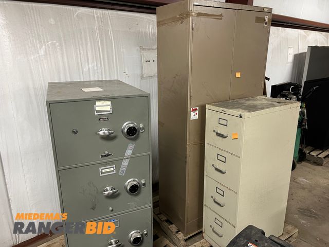 Lot 30-545 - Lot includes Hercules fireproof combination cabinet, and 2 additional cabinets Comes with combinatio...
