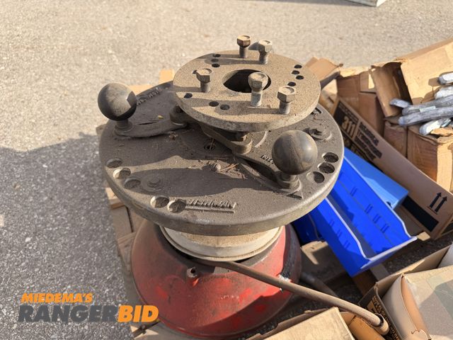 Lot 30-3589 - Pallet of heavy truck pats and accessories including bishman  wheel balancer and more.