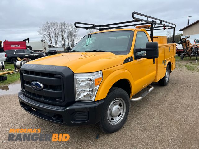 Lot 30-2107 - 2014 Ford 2014 Ford F-250 SD with a 6.2L V8 OHV 16V engine. XLT with 55,404 miles Regular Cab Pickup...