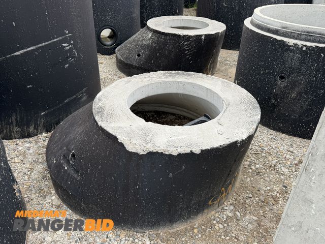Lot 30-5867 - Lot of (2) concrete manhole entries with 23" diameter top entry point.