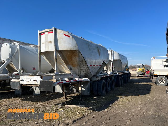 Lot 30-100 - 1973 Fruehauf Tankers (2) Semi-Trailer 1973 and 1973  Fruehauf Double bulk trailers with dolly Tripl...