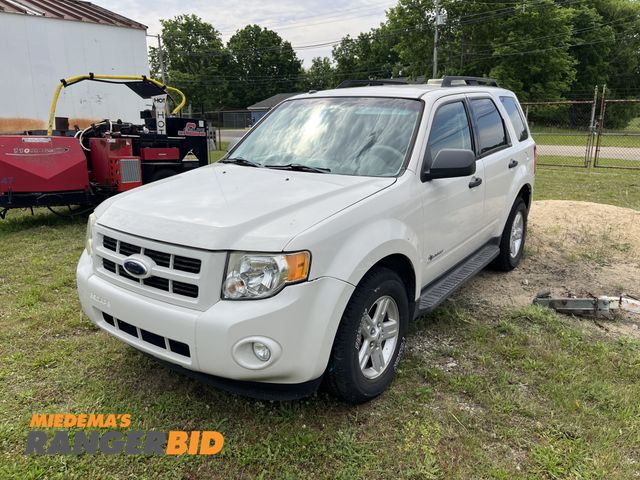 Lot 30-989 - 2009 Ford Escape Hybrid with a 2.3L L4 DOHC 16V HYBRID engine. with 59,365 miles SUV