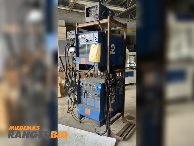 Lot 30-11016 - Lot consisting of Miller Dimension 400 welder, 330ST Aircrafter welder, D-52A wire feeder, Radiator ...