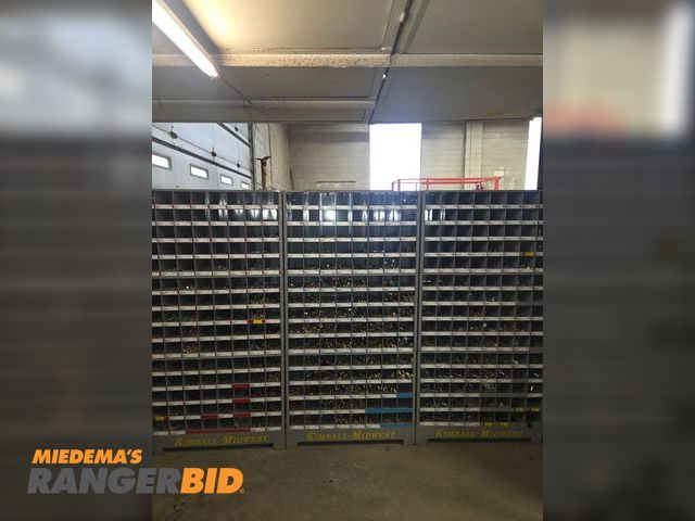 Lot 30-4901 - 2 stacks of standard nuts, bolts, washers. 1 stack of metric nuts, bolts, washers. Comes with storag...