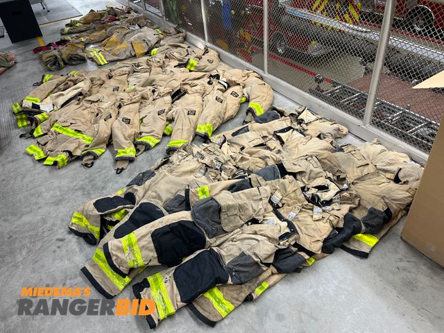 Lot 30-2869 - Lot includes fire fighter coats and bibs shown