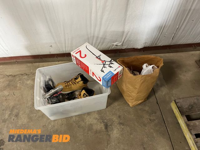 Lot 30-2491 - Lot includes Gun Holsters, Nike boots, and a bike rack