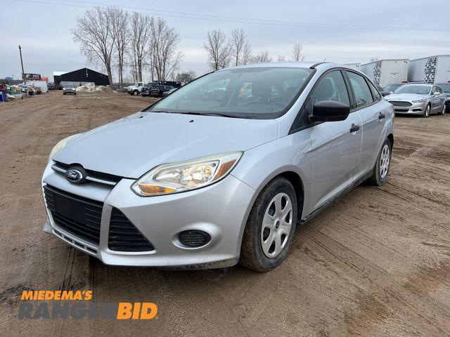 Lot 30-568 - 2014 Ford 2014 Ford Focus with a 2.0L L4 DOHC 16V engine. S with 32,571 miles Sedan FWD
