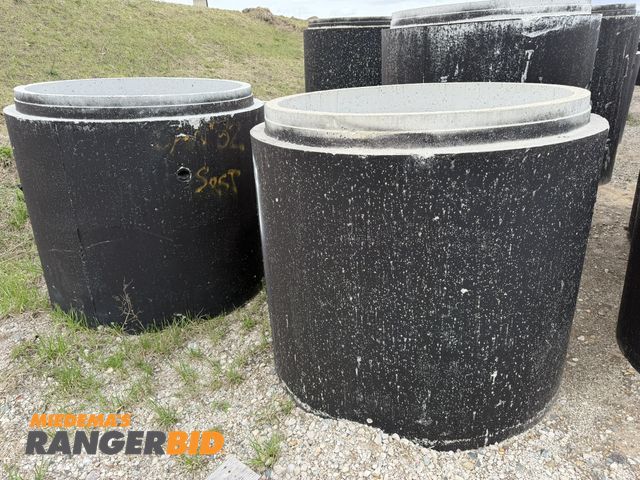 Lot 30-5877 - Lot of (2) 46.5" tall concrete manhole tubes with 4' entry and steps.