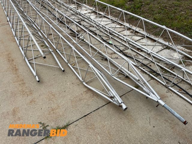 Lot 30-3390 - 7 Aluminum Radio towers. Most are approximately 28' long.  1 is damaged, see pics. Municipality owned. Seller will load.